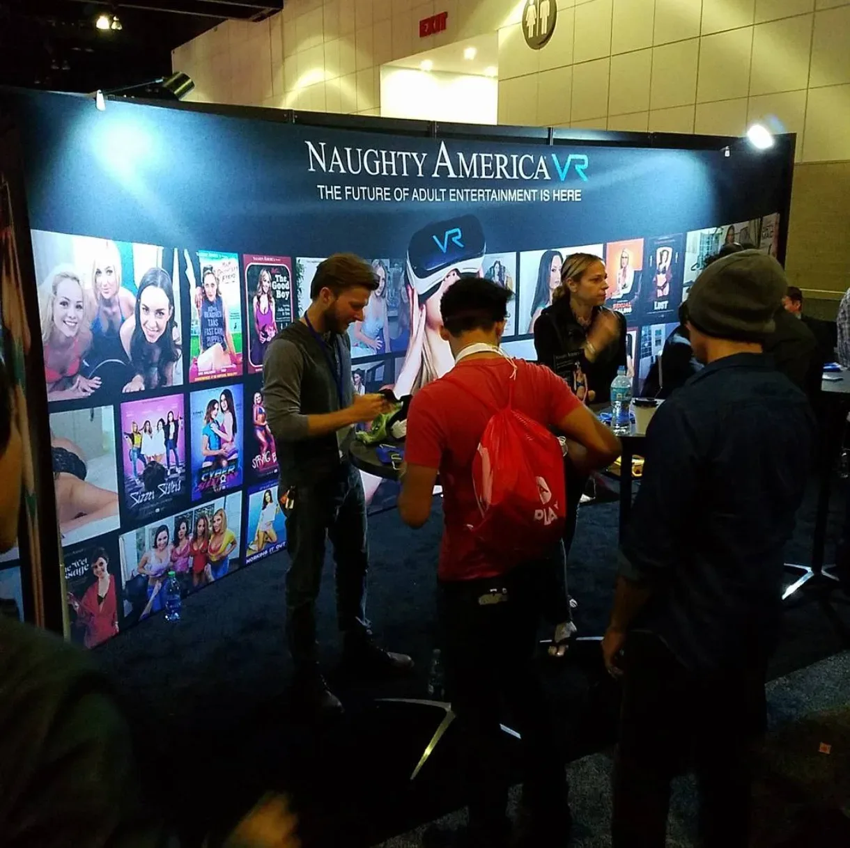 There truly is nothing more awkward than watching VR porn surrounded by dozens of other men waiting in line to watch VR porn.